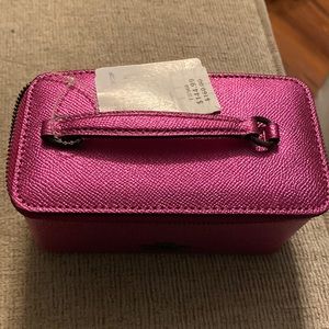 NWT. Coach jewelry vanity case metallic pink